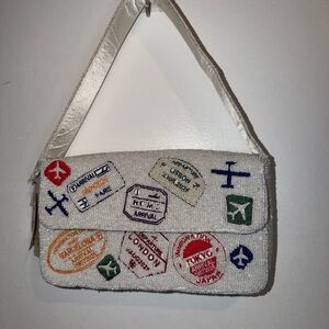 Travel Stamp Embellished Shoulder Bag
